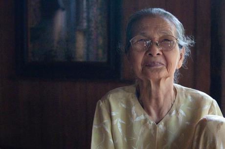 A portrait of an older Asian woman