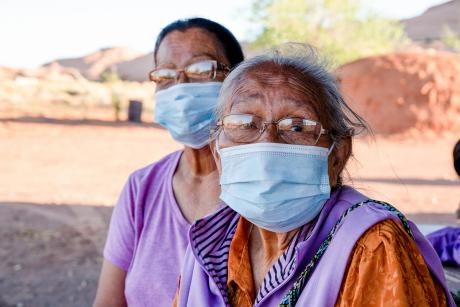 Two older Navajo women wearing masks are at high risk of contracting the Covid19 virus, Monument Valley, Navajo Nation Territory