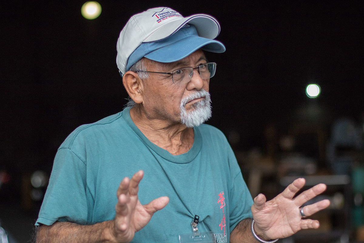 Walt Miyashiro engages with other Shedders in Honolulu.