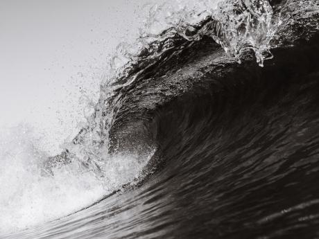 Black and white image of a wave. Photo by Matt Hardy on Unsplash