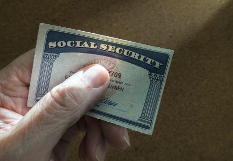 hand holding a Social Security card