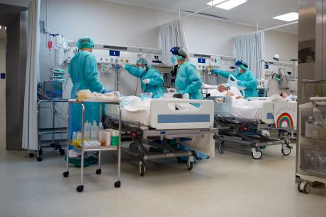 Doctors treating patients in an ER