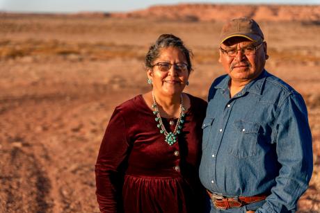 A Native American couple near their home in Monument Valley, Utah