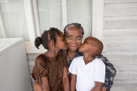 Older African American woman with her two grandkids