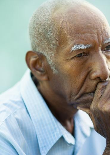 Portrait of contemplative older Black man