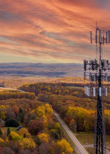 Cell tower over rural landscape