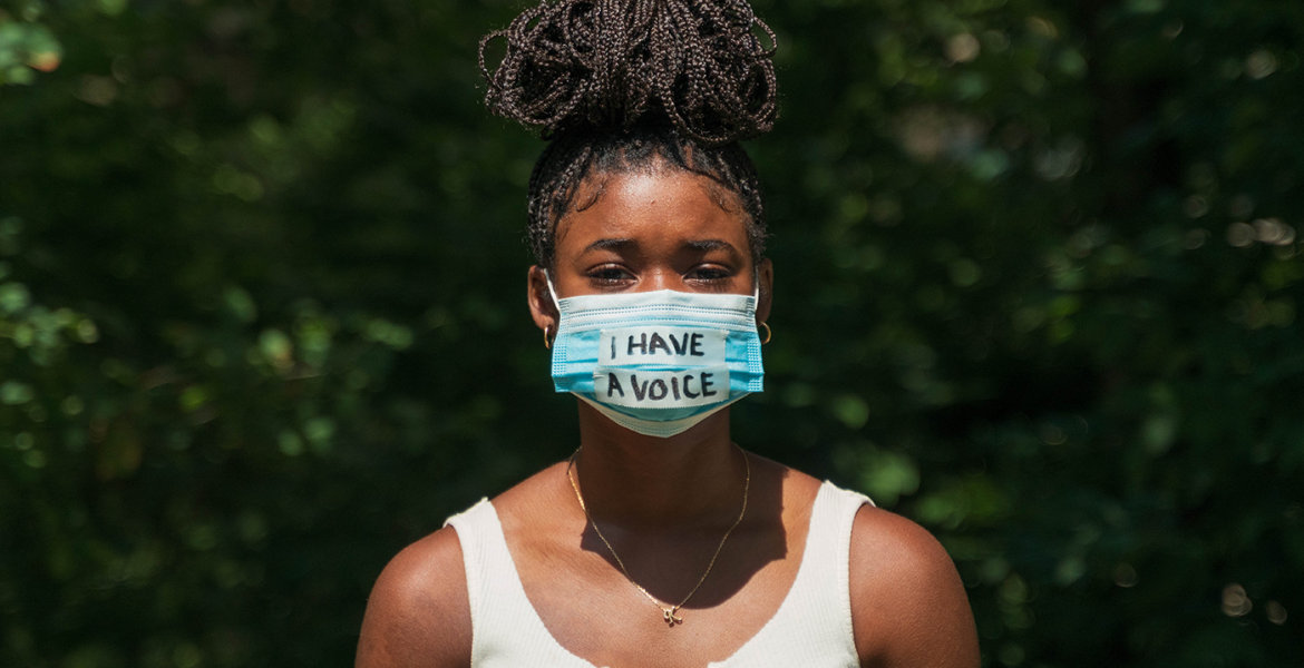 I have a voice on a mask worn by a young black woman protestor