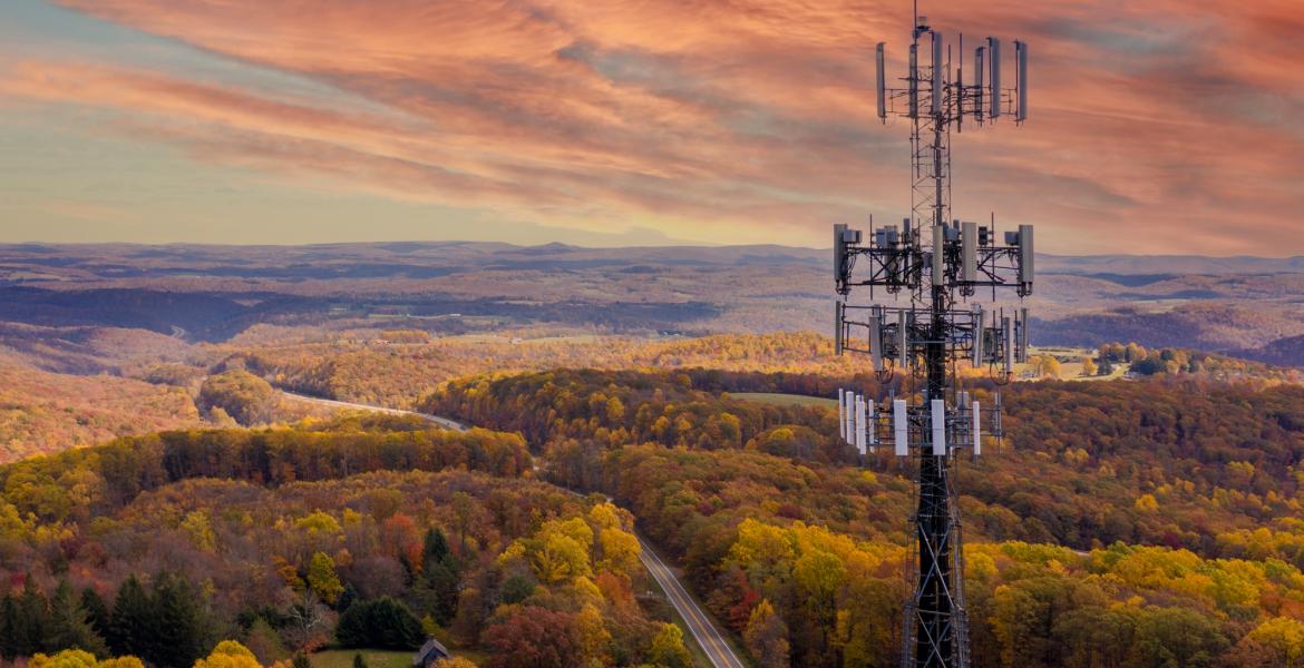 Cell tower over rural landscape