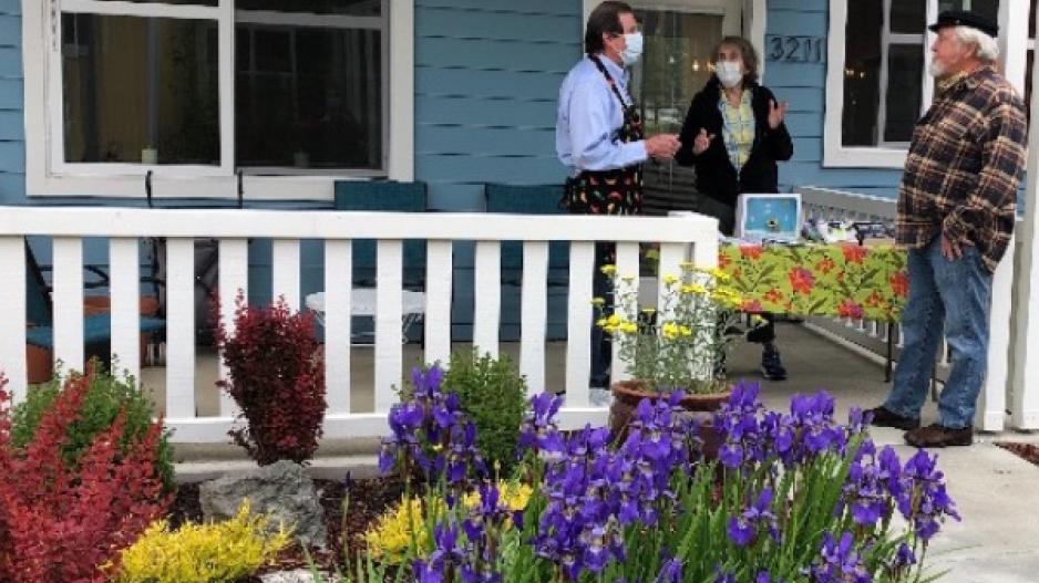 Residents chatting on a patio