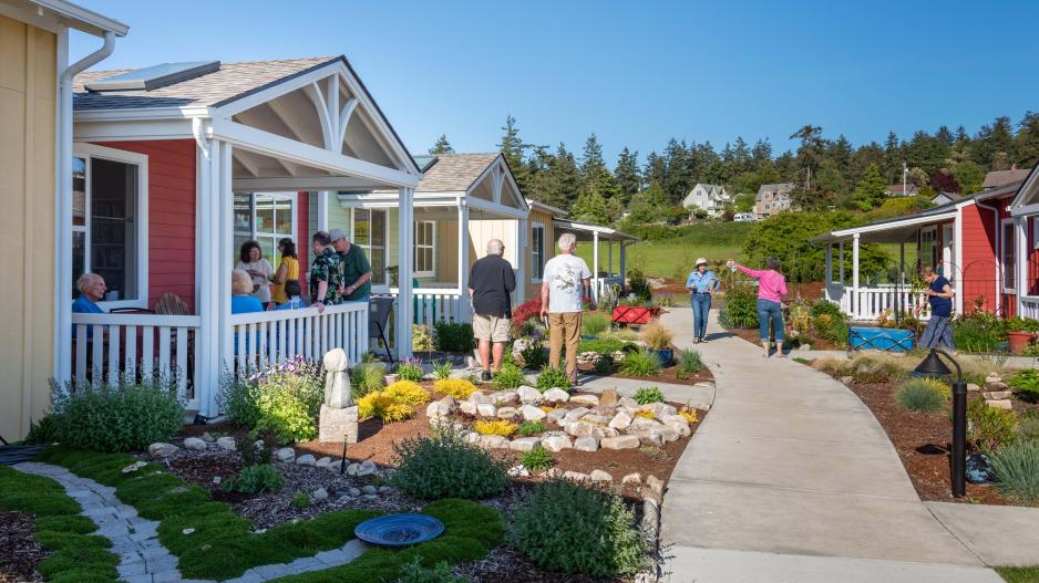 Quimper Village residents gather one of the lanes between houses (pre pandemic). Photo courtesy of Durrett Architects